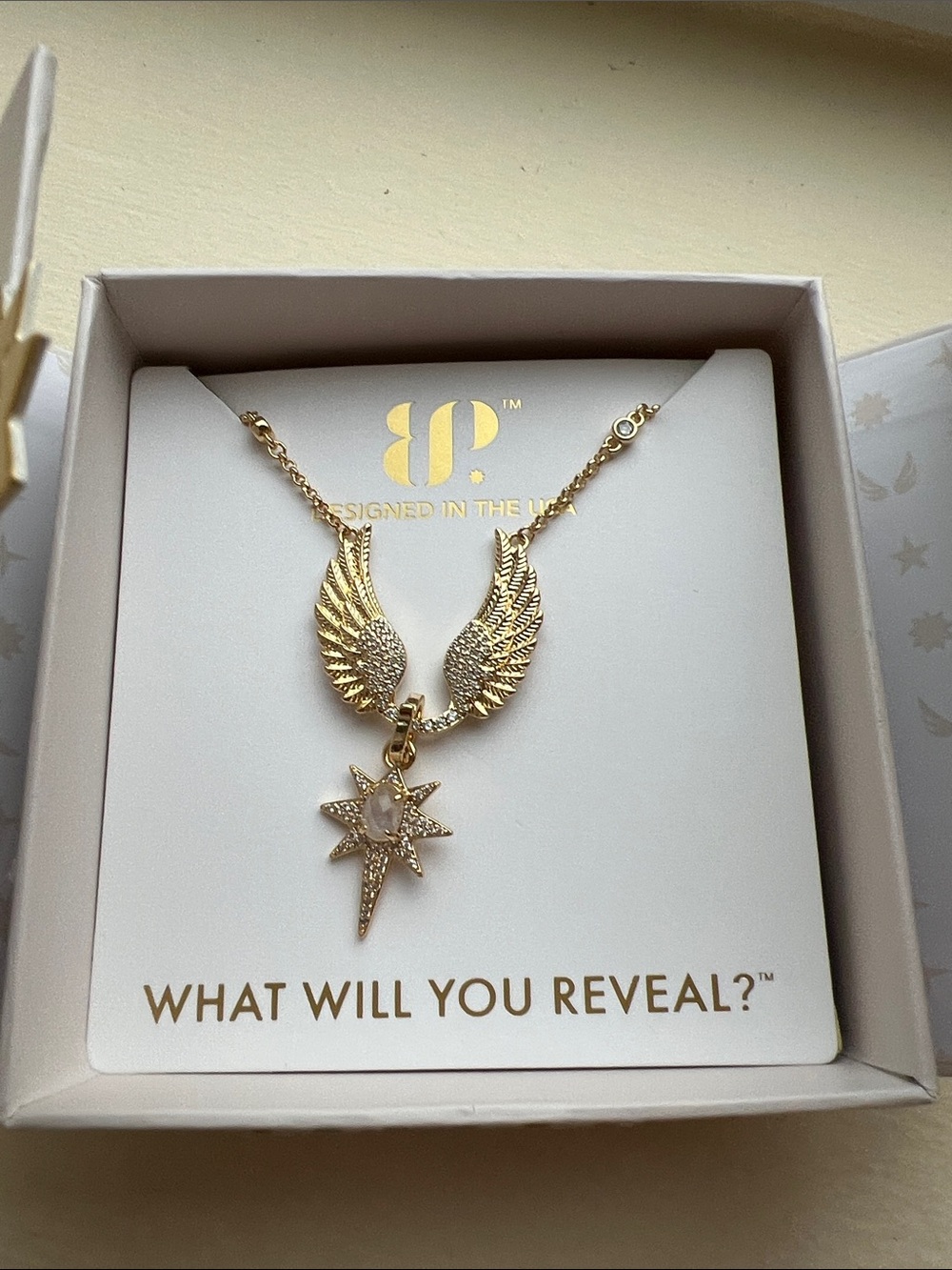 bp Gold-Tone Wing and Star Pendant Necklace